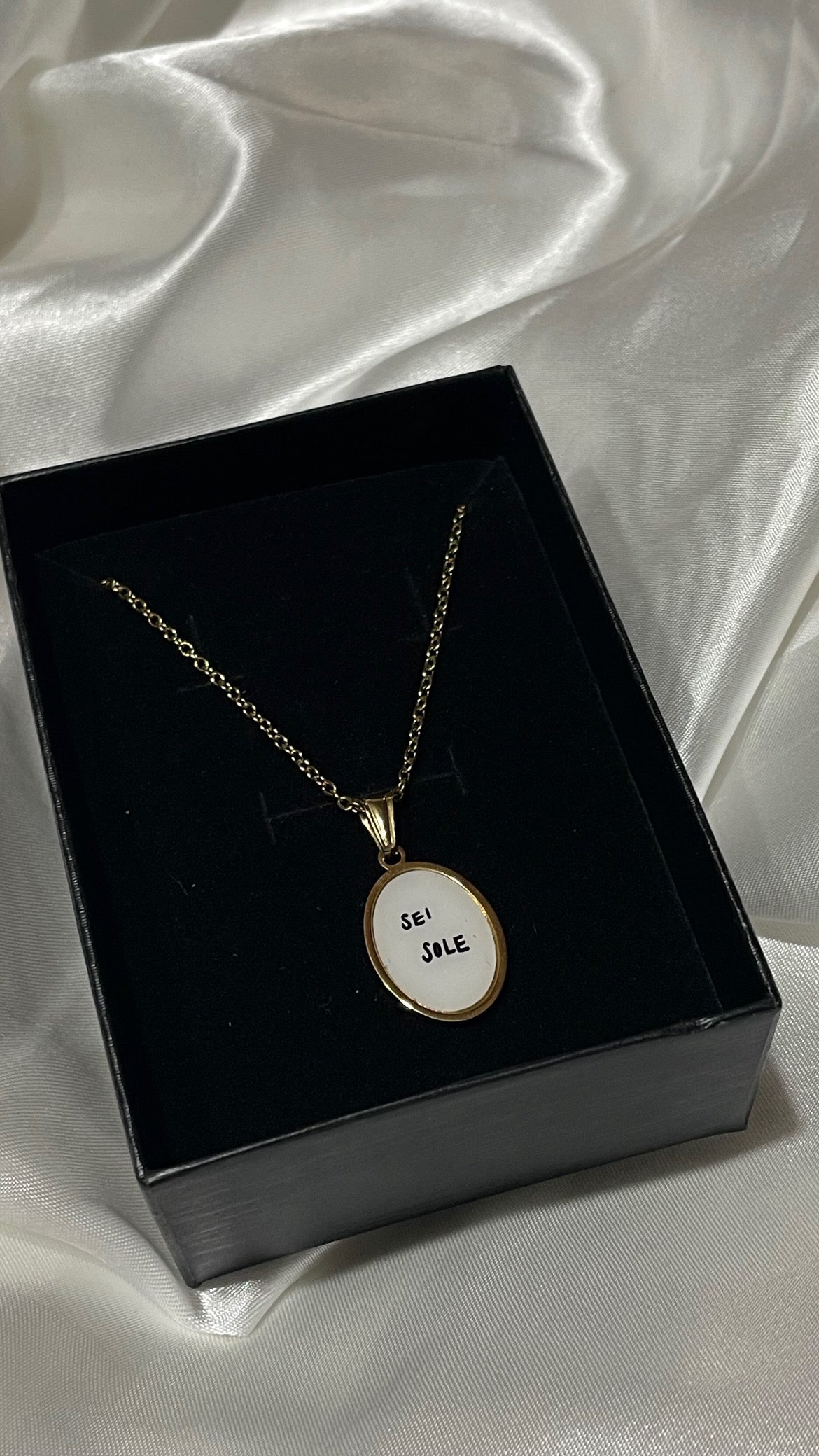 Collana con medaglietta